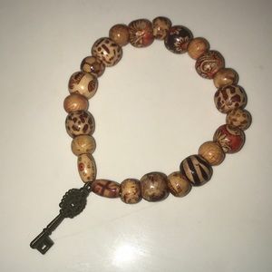 Wooden bracelet with Key charm